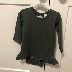 Kate Quinn long sleeve ruffle leg bodysuit